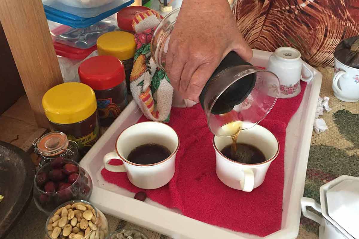 drinking colombian coffee farm